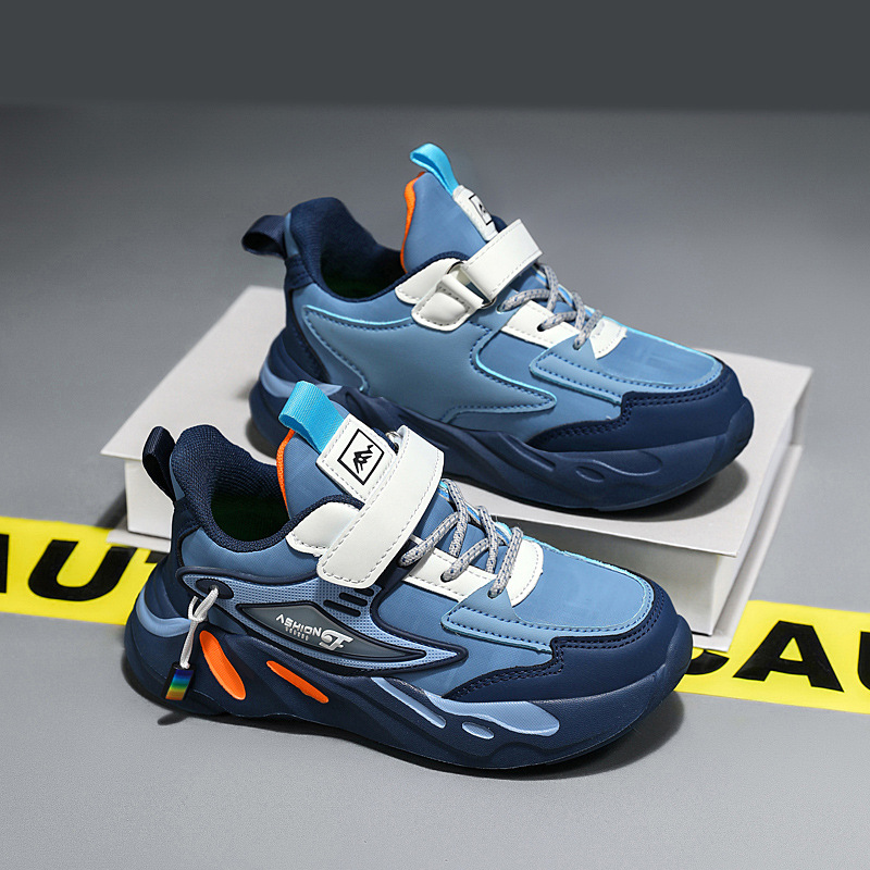 Zapatos de los muchachos al por mayor zapatilla de deporte otoño nuevos zapatos de malla de fondo suave niños medianos y grandes niños malla blanca zapatos estudiantes