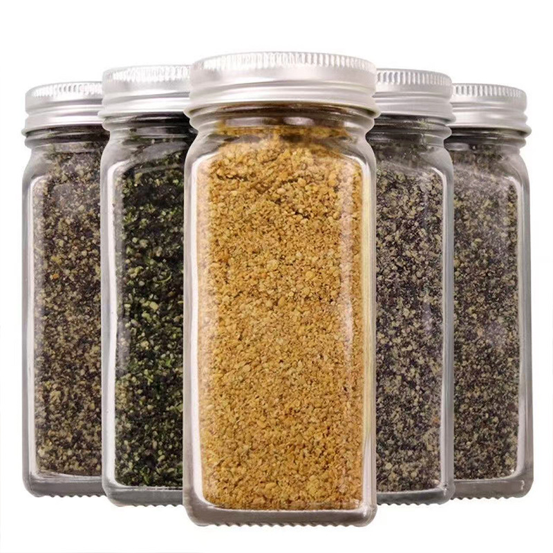 Botella de almacenamiento de cocina con cubierta de la lata de especias de vidrio, botella de sellado de cuatro piezas, botella de distribución de comino
