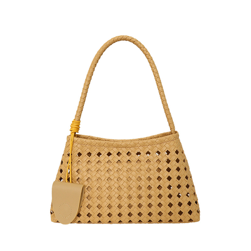 Bolsa de brazo hueco para mujeres 2026 verano nuevo estilo francés lujoso viaje de hombro portátil bolso de palo