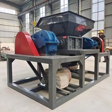 久诺供应大型废铁破碎机废冰箱铁皮强力粉碎机双轴对辊撕碎机