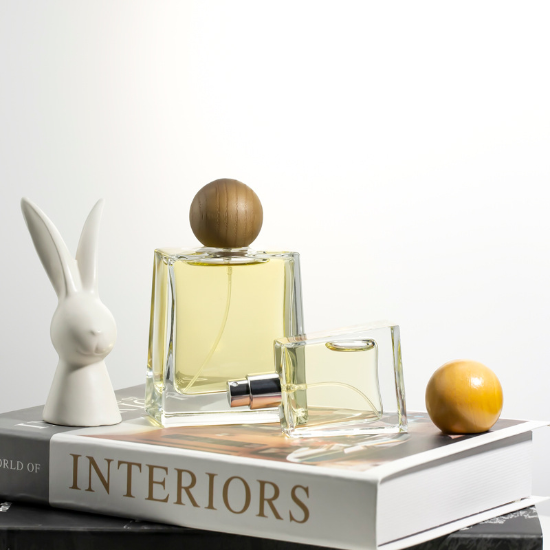 供应新款香水瓶30ml100ml梯形按压式喷雾瓶厚底配圆球木头香水盖