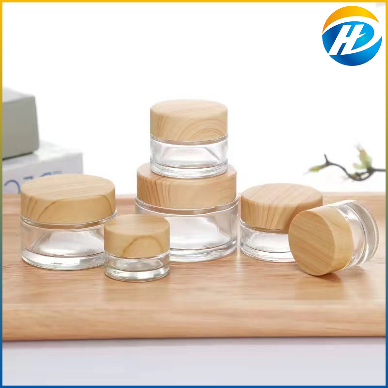 Venta al por mayor de madera grano cubierta botella de crema facial botella de crema botella cosmética de vidrio esmerilado 30g 50g crema sub-botella