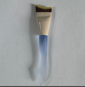 Light blue one-word crescent foundation brush