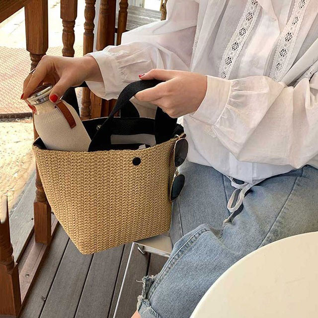 Nieuwe Bucket Ins Designer Stijl Zomer Strand Uitje Geweven Vintage Handtas van Geweven Stro Sanmi Niche Design_voghion.com