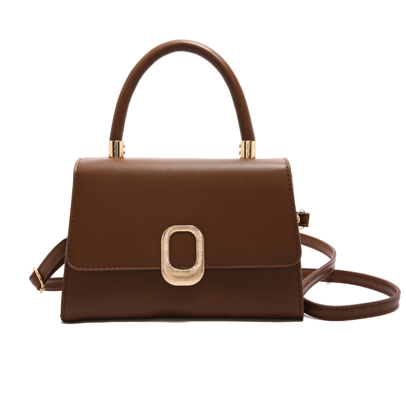 Moda y estilo occidental simple 2025 nuevo bolso de mensajero de un solo hombro de color sólido de moda elegante bolso cuadrado pequeño portátil de viaje de primavera mujer
