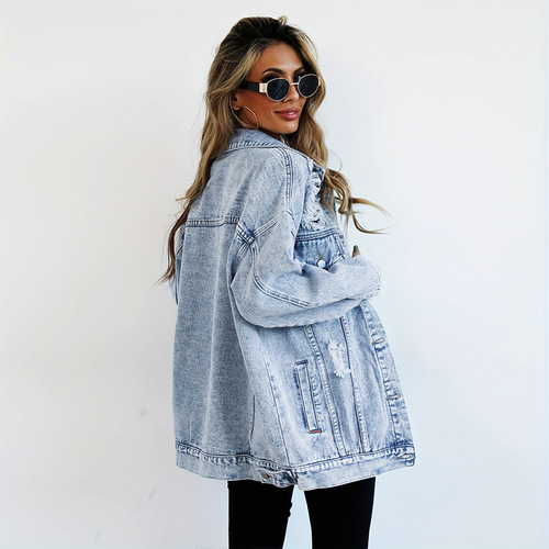 High-end, super-stylish women's jacket—designer, niche, workwear-inspired, distressed, trendy, Harajuku-style denim jacket for fall and winter.