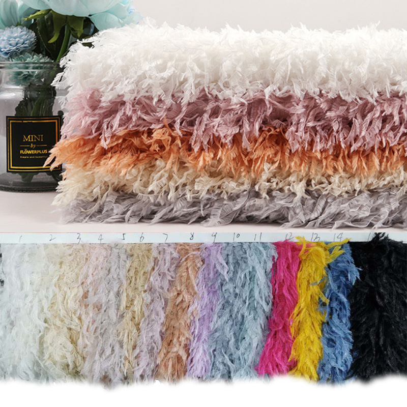 现货供应羽妃绒 长毛流苏绒布 童装工艺品玩具长毛绒面料免费拿样