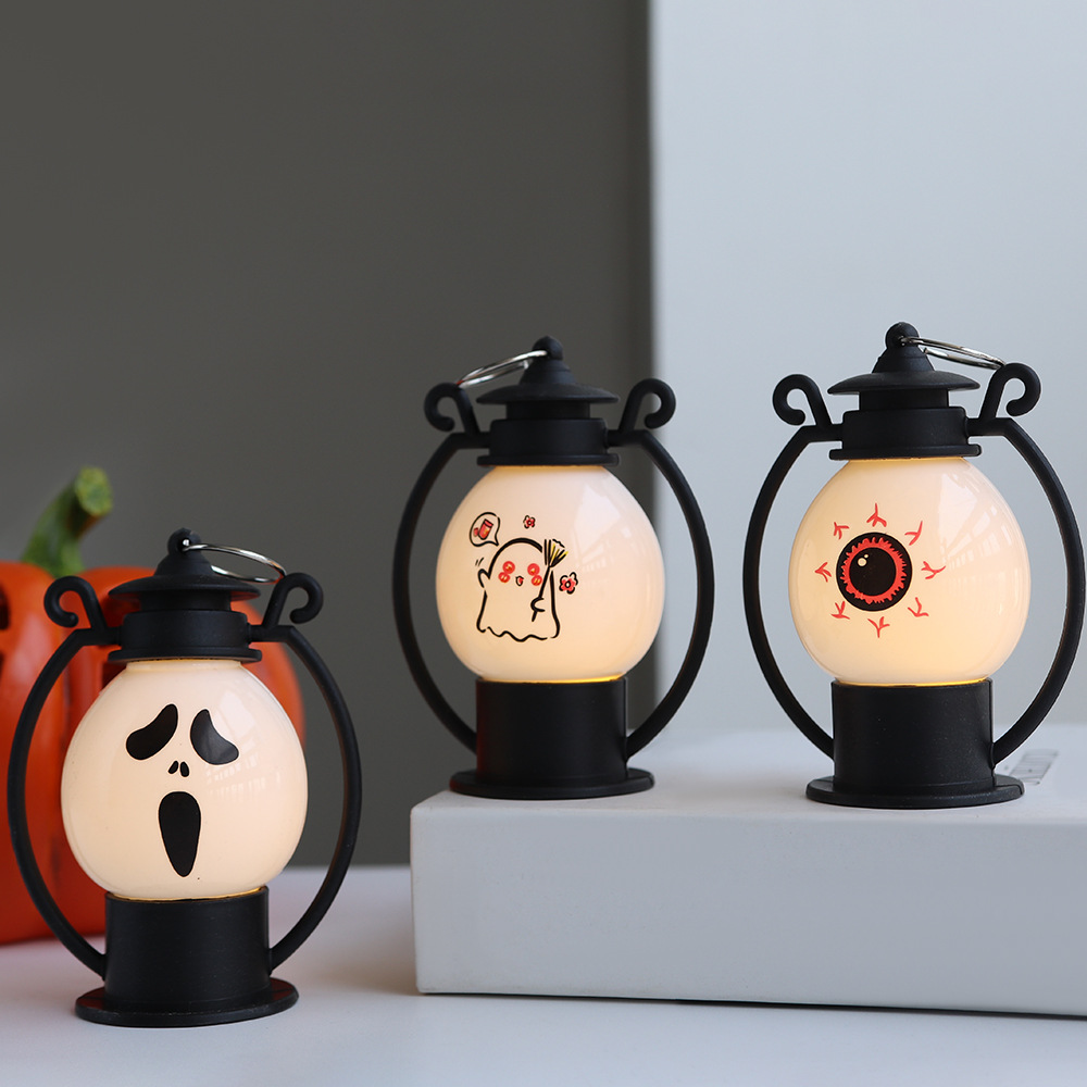 Linternas de calabaza portátiles de Halloween, nuevos accesorios de diseño de atmósfera transfronteriza, decoración de lámparas de aceite pequeñas, linternas nocturnas, linternas
