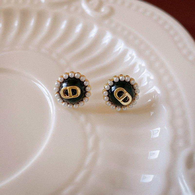 Pendientes de mariposa plisados de circón con aguja de plata Pendientes pequeños y frescos de moda simple Pendientes ligeros de lujo de alta gama al por mayor