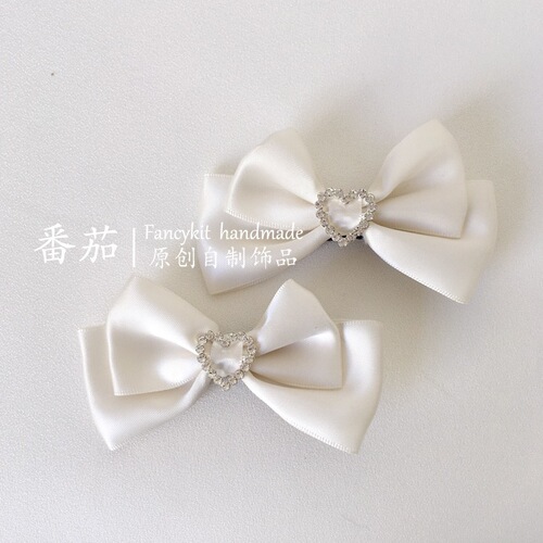 Handcrafted Japanese-style Lolita rhinestone heart bow hair clips, JK-inspired headwear, and delicate, fresh-look hair accessories.