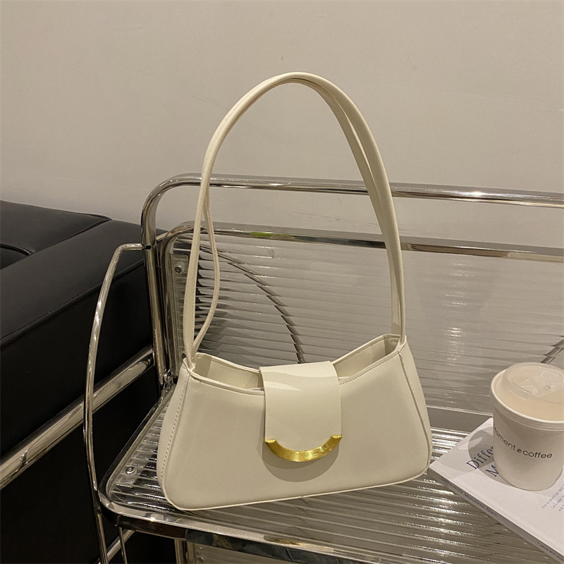 Textura de moda casual bolso bajo 2025, principios de primavera nueva personalidad ins bolso de hombro de aire extranjero, textura de moda bolso de mochila