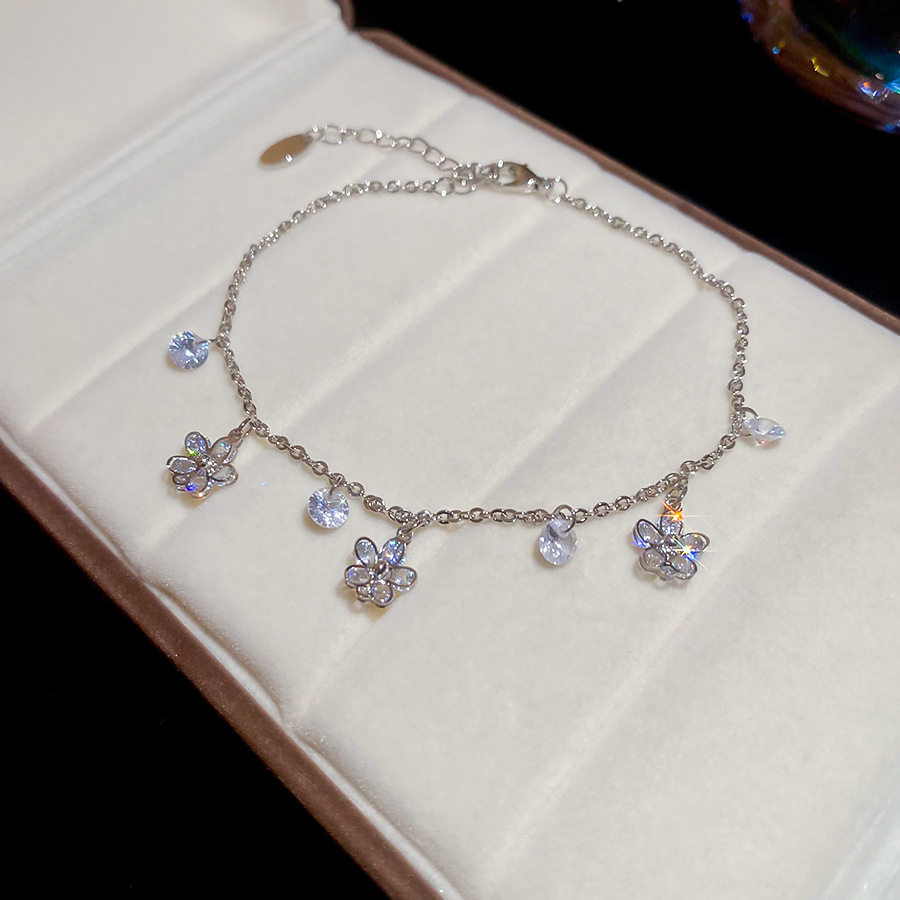 Colgante de flor redonda de circón tobillera para mujer, lujo ligero, sentido de alta gama, anillo de pie, nicho, moda simple, accesorios de pie de todo fósforo al por mayor