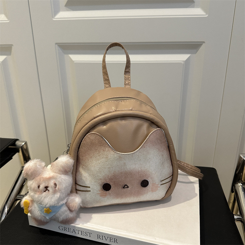 Mochila de dibujos animados de alto nivel para mujeres 2025 nueva moda mochila de viaje, mochila de mamá, mochila escolar casual coreana.