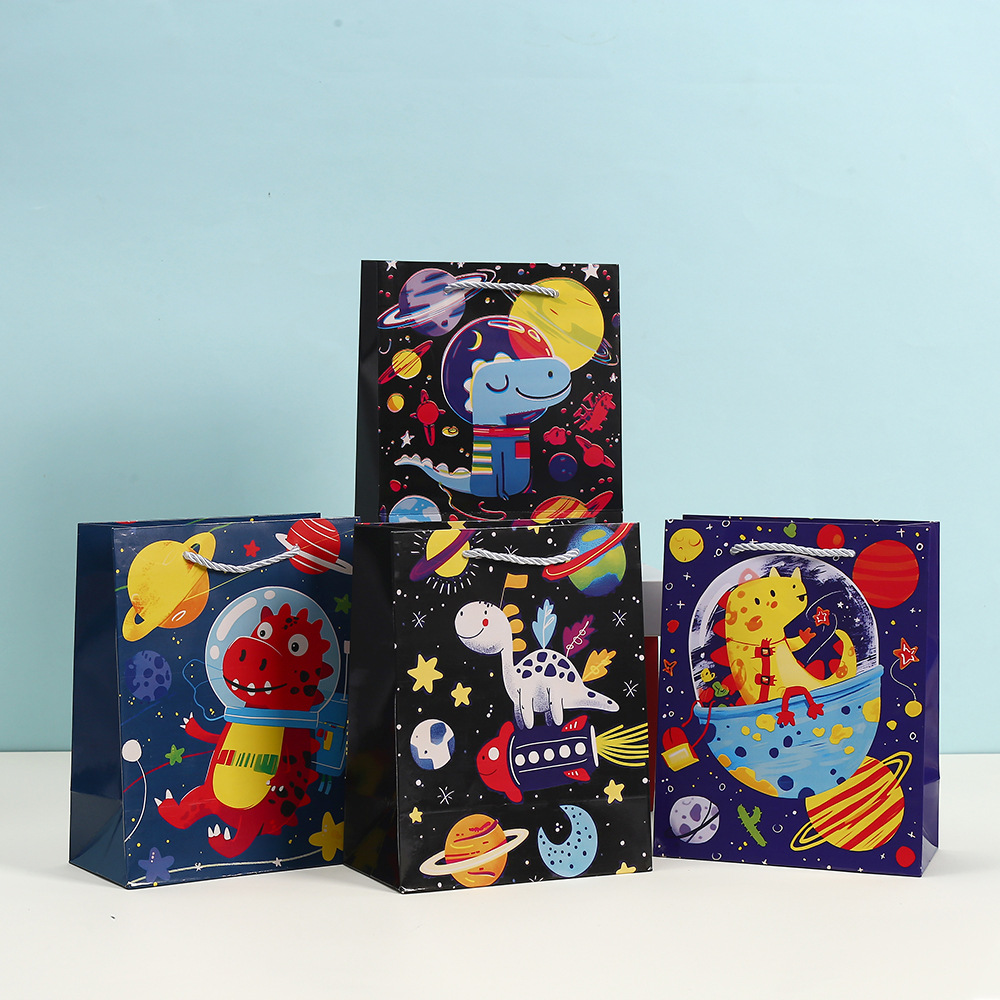 卡通印花包装袋白卡购物礼品袋批发派对糖果纸袋太空恐龙手提袋