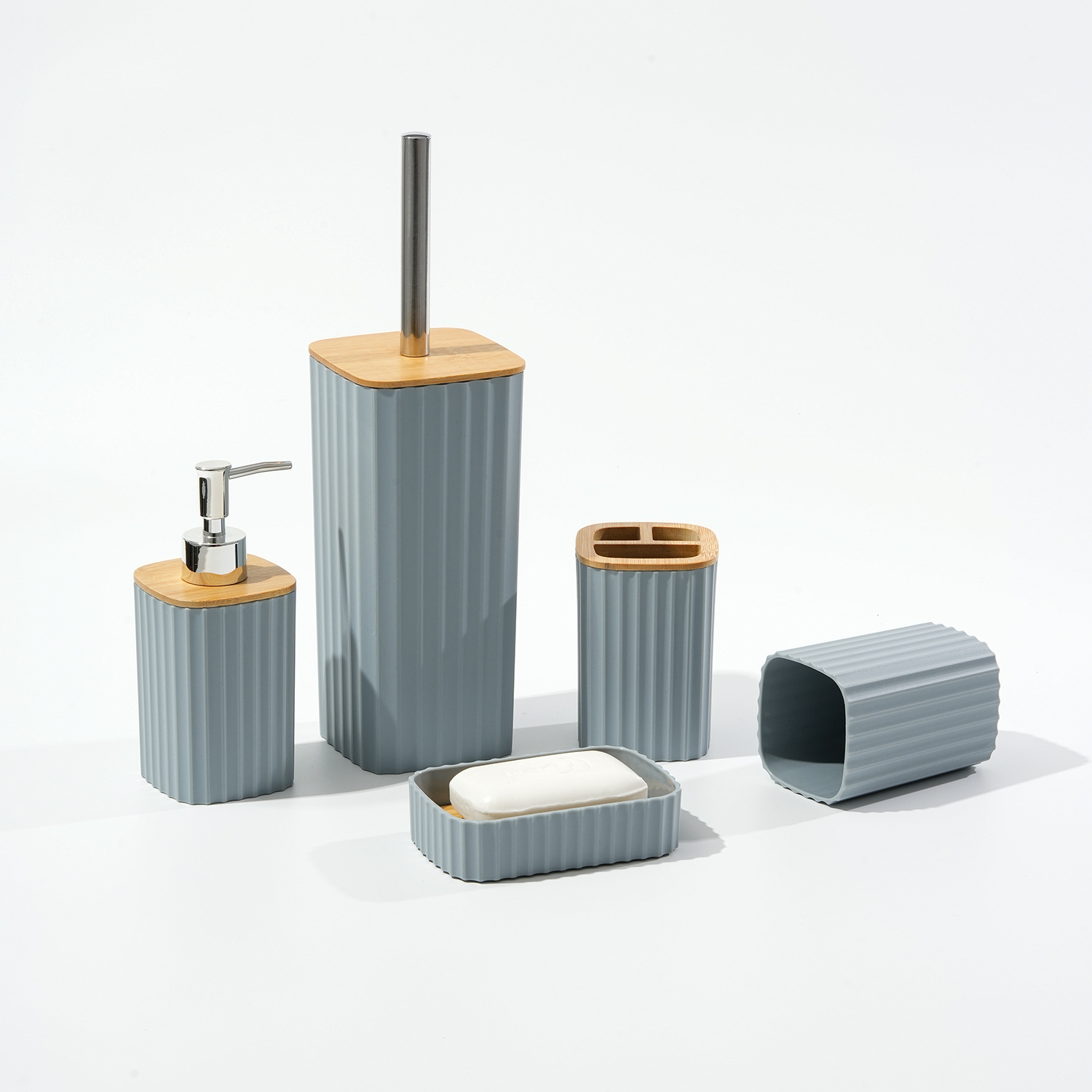 Baño de rayas cóncavas de 5 piezas conjunto de cepillo de inodoro de rayas verticales domésticas botella de embalaje de emulsión de cepillo de dientes taza caja de jabón conjunto