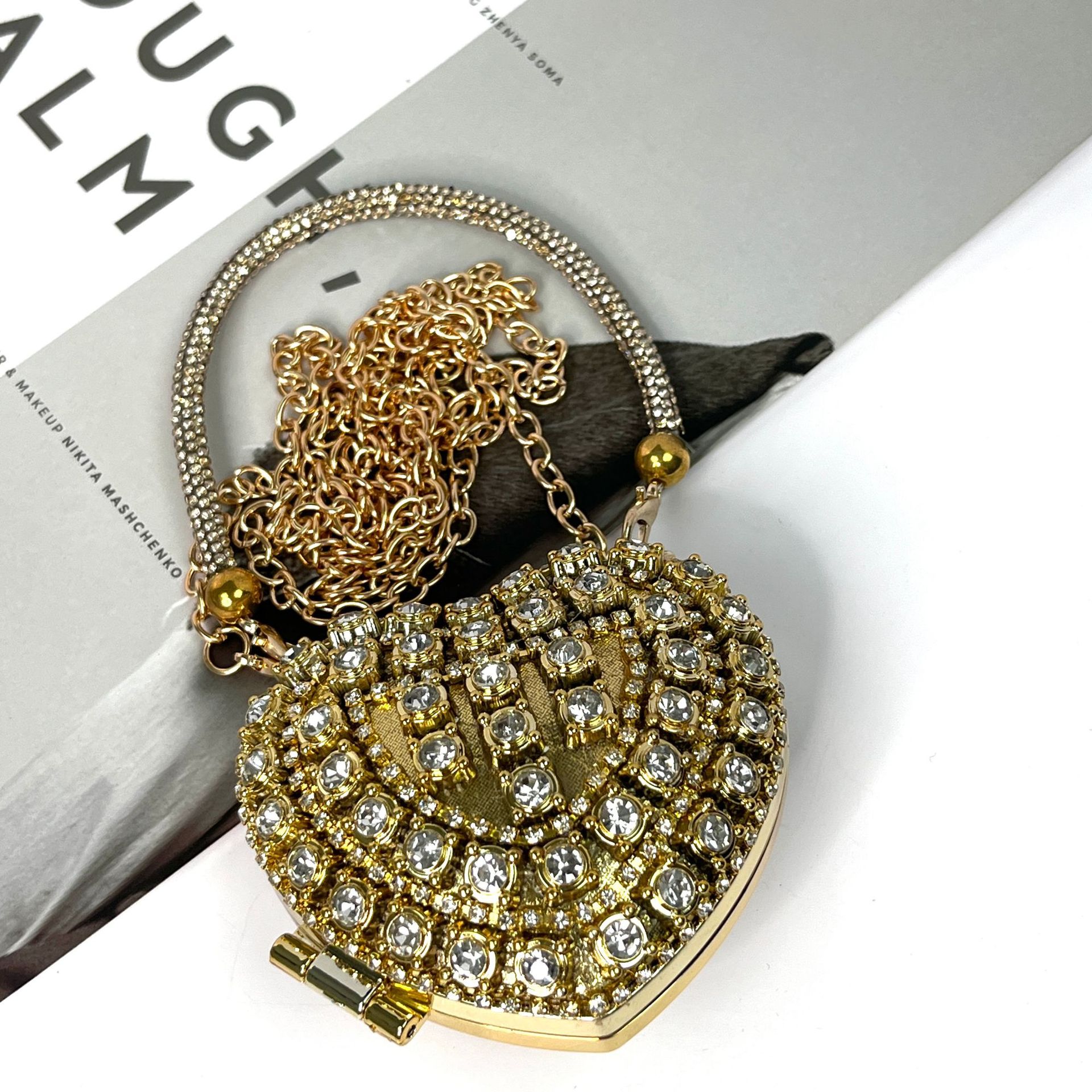 Golden vertical triangle diamond love handbag