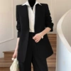 Black one piece suit