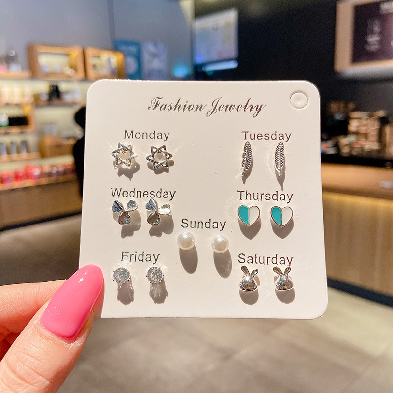 Pendientes de aleación Pendientes de alta calidad de perlas para mujer Pendientes exagerados de temperamento de lujo ligero coreano Pendientes largos con borlas al por mayor