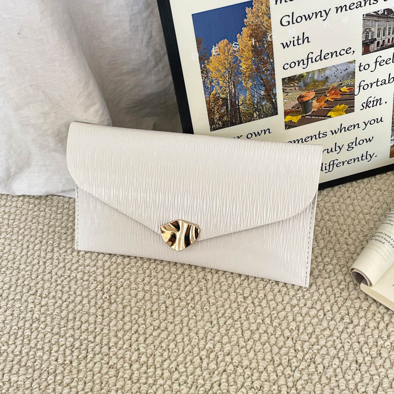 Casual simple estilo exterior de moda sobre de mano bolsas de mujer verano 2026 nuevo nicho coreano diseño textura de viaje