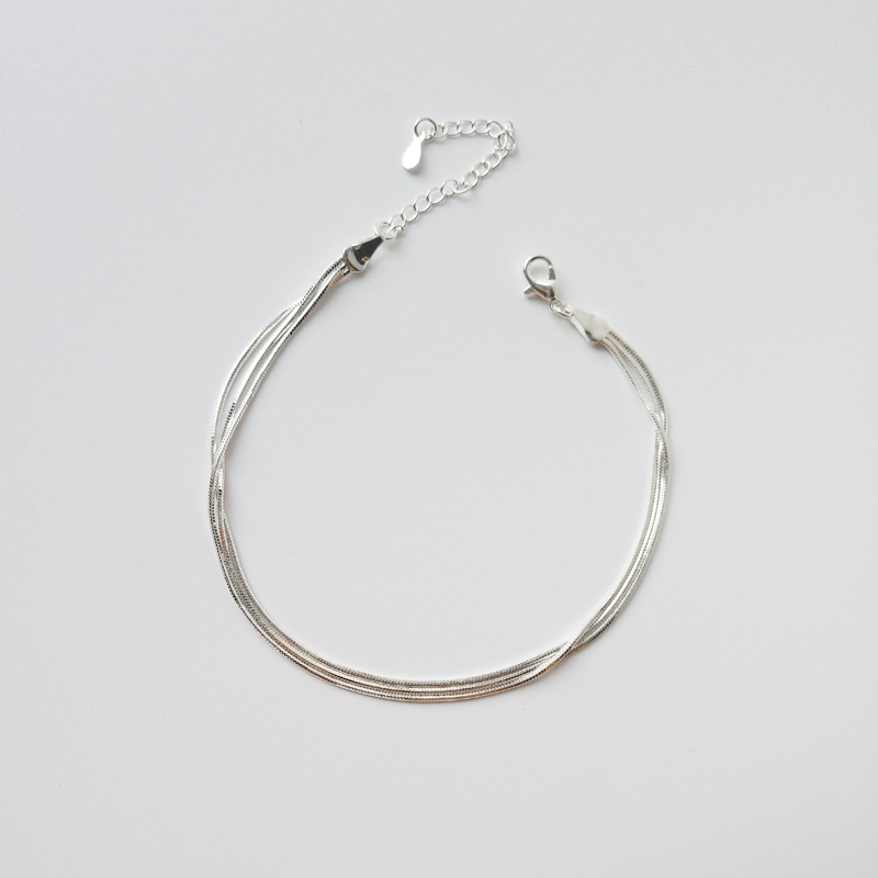 S925 plata esterlina hueso de serpiente tobillera hombres y mujeres personalidad de la moda ins elegante tobillera simple cadena de tobillo de tres capas