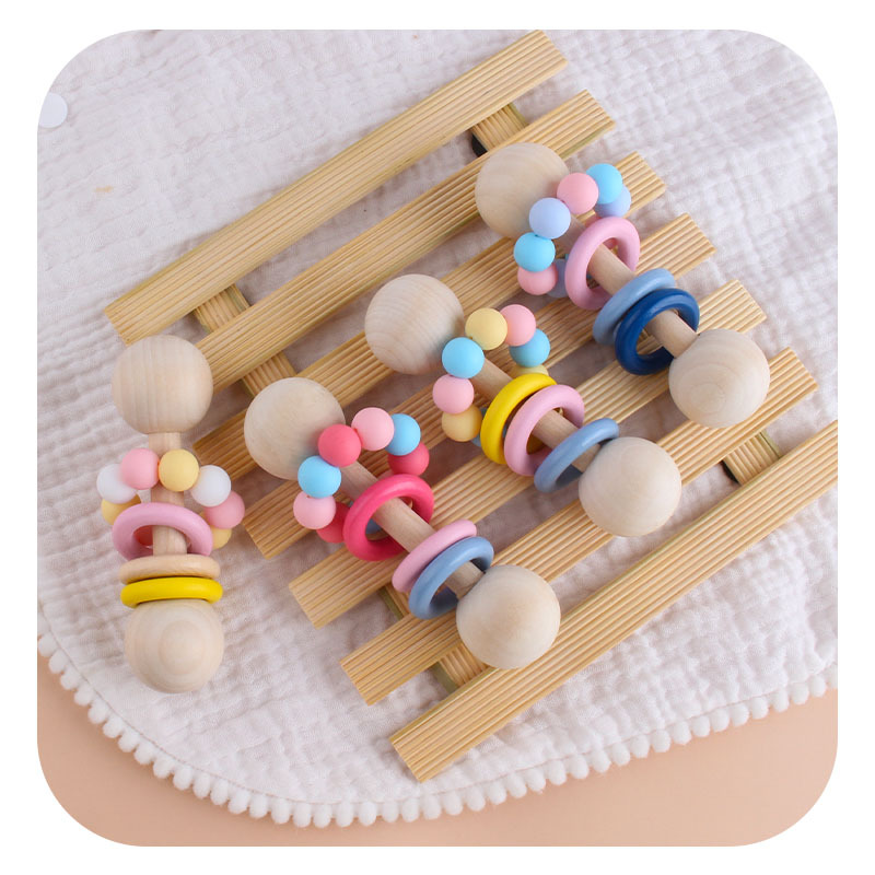 Nuevos juguetes creativos para niños de goma de madera para bebés agarrar mano de agitación de perlas de molar para bebés ejercicio interactivo varilla
