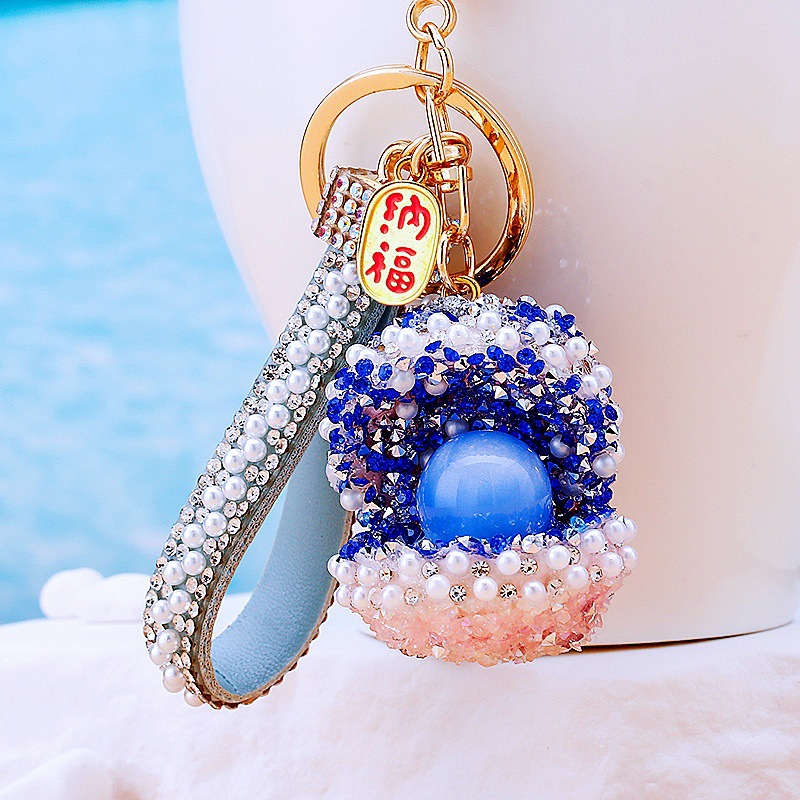Cornucopia shell pearl sparkling sapphire blue