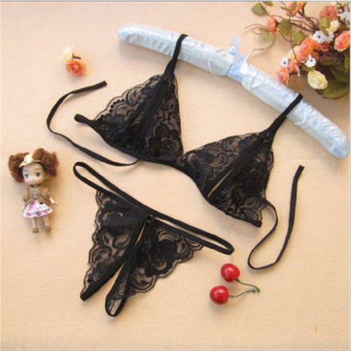 Erotic lingerie: seductive, sexy lace, sheer women's thong set with open crotch—wholesale available