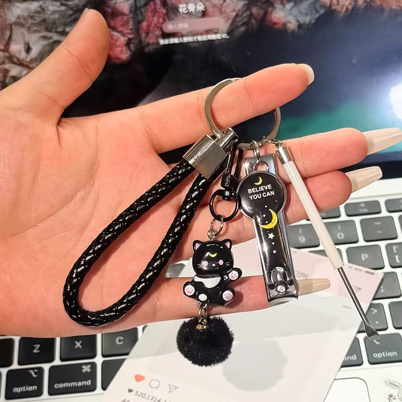 Black leather rope + black cat hair ball pendant + black moon nail scissors + wh…
