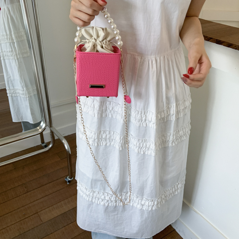 Niche Zhong moda bolso de cubo de mano mujer 2025 nuevo estilo coreano simple versátil bolso de hombro con patrón de ramas