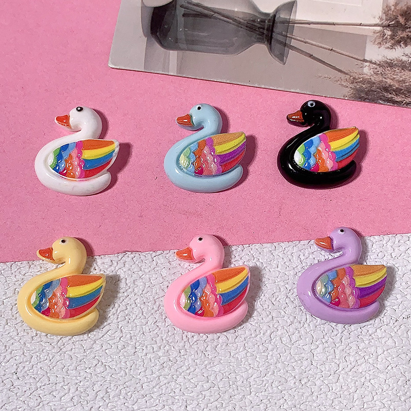 Nuevo colorido cisne diy accesorios de resina crema pegamento para el cabello clips para el cabello teléfono móvil agujero agujero hebilla hecha a mano al por mayor