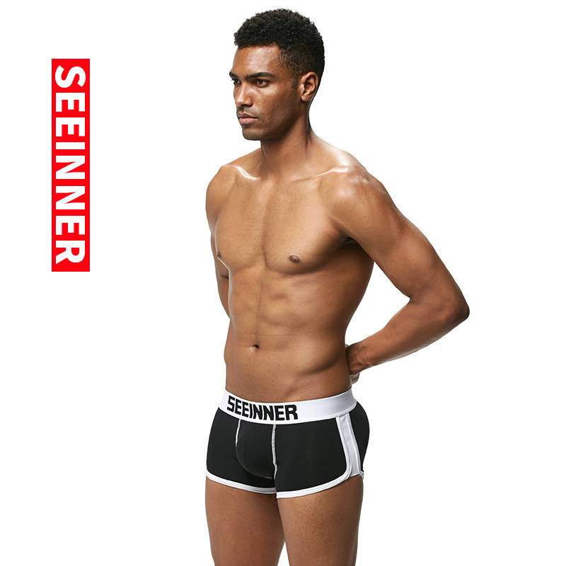 Ropa interior masculina para exportación en AliExpress y Amazon, calzoncillos bóxer de algodón con relleno en la cadera, color liso, nuevo diseño transpirable que realza la cadera.