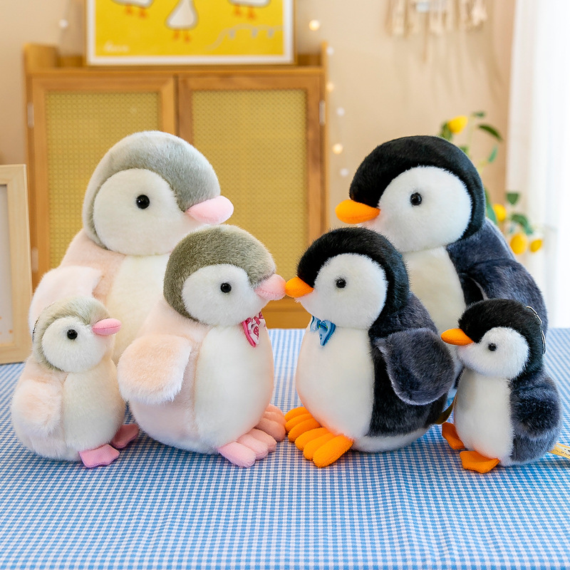 Nueva pareja pingüino de peluche de juguete llavero muñeca transfronteriza máquina de agarre muñeca de tamaño pequeño regalo de la muñeca al por mayor
