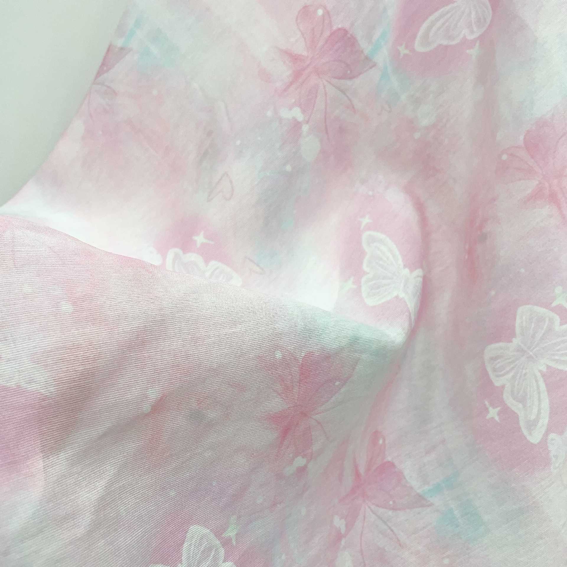 粉色清空蝴蝶印花团花苎麻面料人棉印花现货