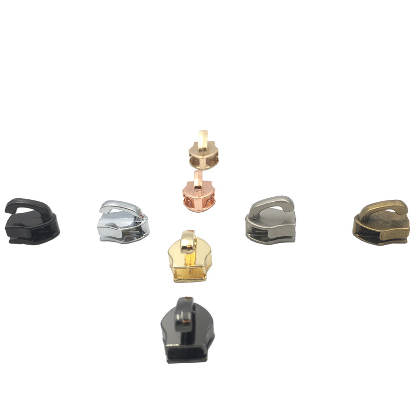 En stock al por mayor N ° 3 N ° 5 N ° 10 dientes de goma de nylon elefante nariz de una sola cabeza equipaje cabeza colgante chapado rodillo chapado multi-color