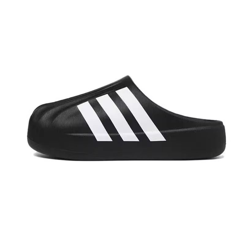 Putian EVA auténtico primavera y otoño nuevo tipo de zapatillas de cabeza de conchas de dopamina para hombres y mujeres zapatillas de agujero de fondo grueso