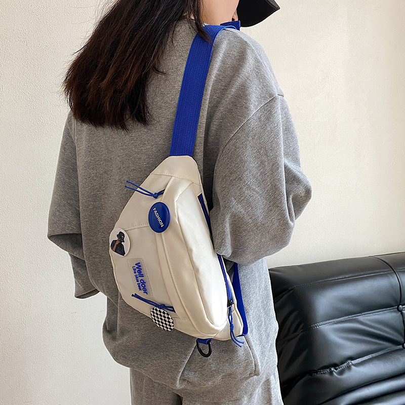 Marca de moda bolso de pecho japonés de los hombres ins bolso de hombro simple bolso de la cintura mochila bolso de hombro pequeño bolso de mensajero de estudiante simple de las mujeres