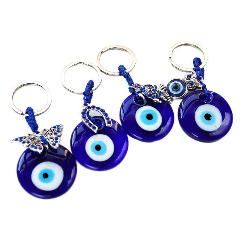 Cruz De La Frontera estilo turco griego ojos azules colgante llavero colgante de diamante incrustado ojo oblicuo joyería del ojo del diablo al por mayor