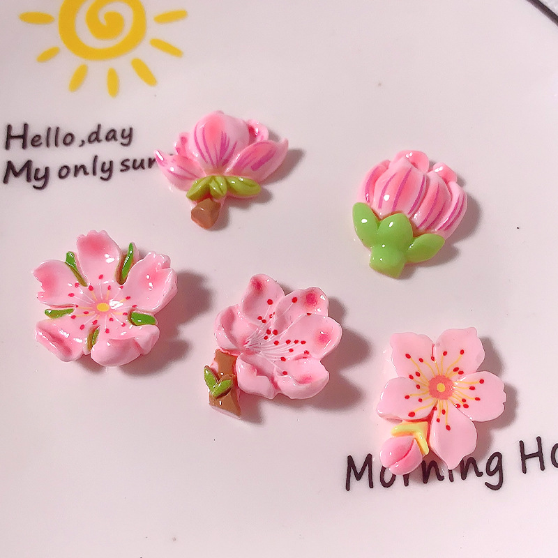 Nuevos accesorios de resina de bricolaje de flor de durazno rosa de dibujos animados, pegamento de crema, carcasa para teléfono móvil, accesorios para el cabello, zapatos, colgantes de hebilla, materiales hechos a mano