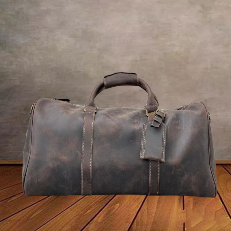 Bolso de viaje unisex de cuero transfronterizo Bolso de gimnasio de mensajero de un solo hombro Bolso de equipaje ultraligero de cuero curtido vegetal