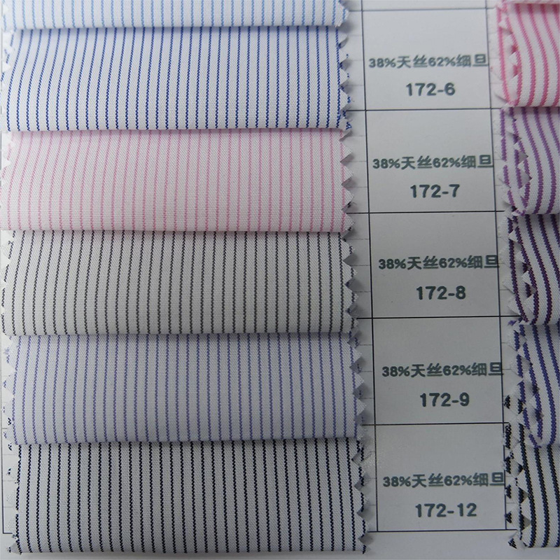 现货供应天丝细旦条细格子成分38%天丝62%超细旦米通流行时尚面料