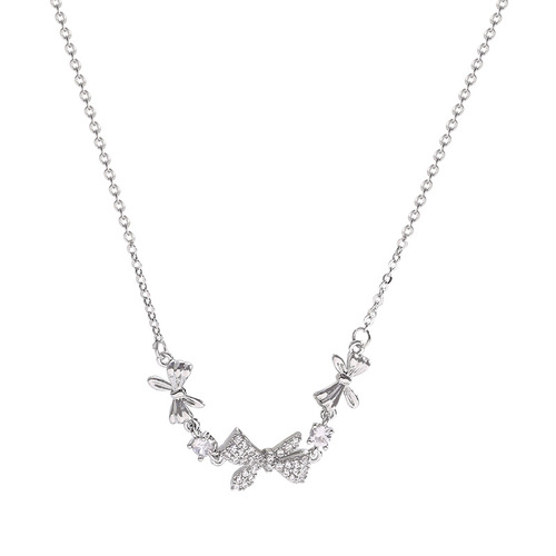 Korean micro-encrusted diamond bow titanium steel necklace women's ins trend light luxury niche pull-out bracelet two-piece set