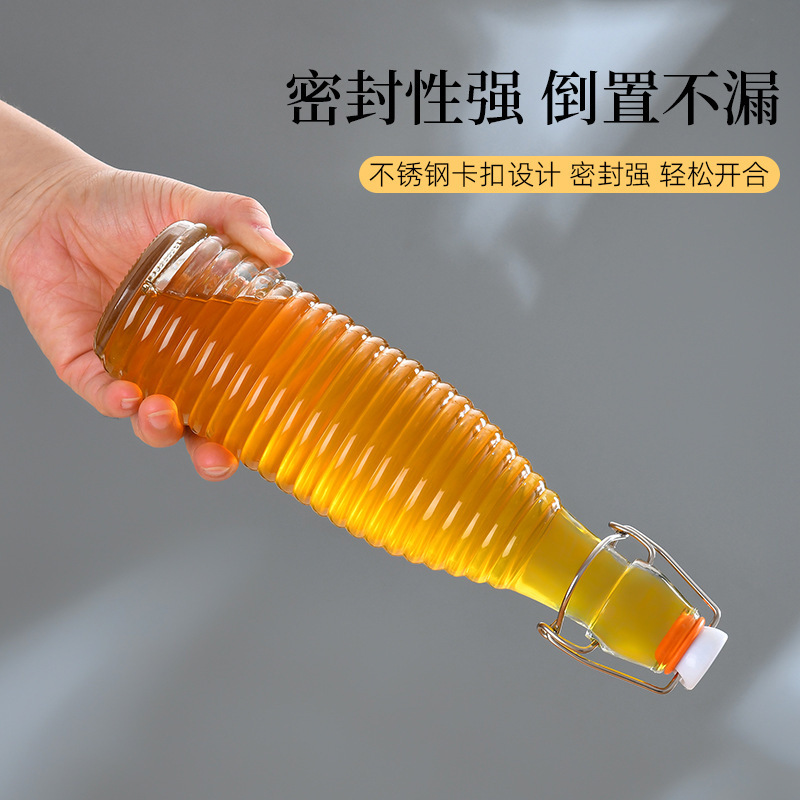 Botella de bebida de vino de fruta transparente botella de enzima de sellado botella de leche botella de jugo botella de aceite doméstica botella de vidrio de sellado de presión