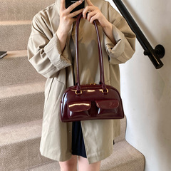 クロスボーダーのファッション女性の春の高級な美しさは小さい方のカバンのわきの下のカバンを持って2025新型の大容量の郵便便のカバンを包みます。