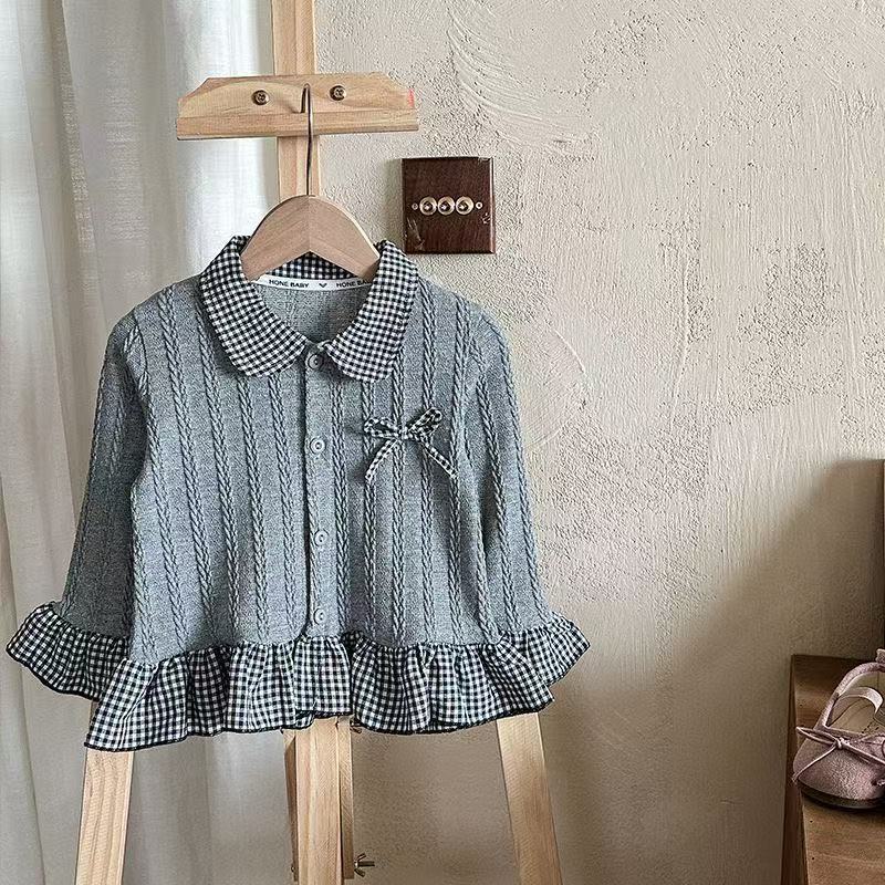 2026 primavera nueva camisa de cuello de muñeca de cuadrícula de mangas largas de encaje arco de camisa de estilo occidental para niños