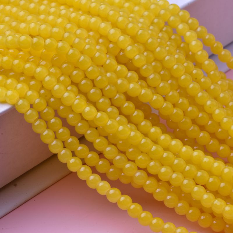 Glass multicoloured round beads