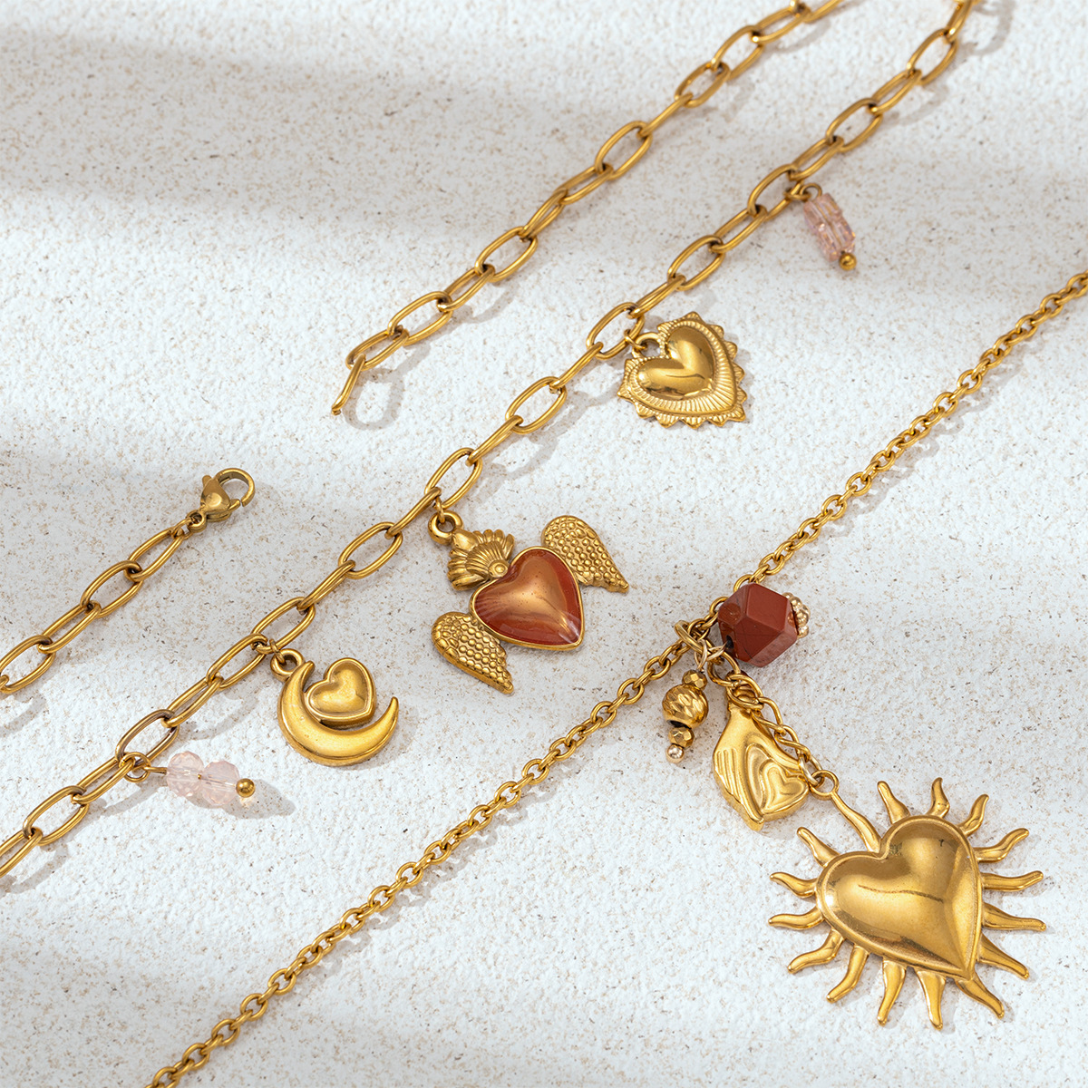 Collar de acero inoxidable TENA Europa y los Estados Unidos nicho ligero de lujo sol amor multi-colgante conjunto de joyería universal venta caliente transfronteriza