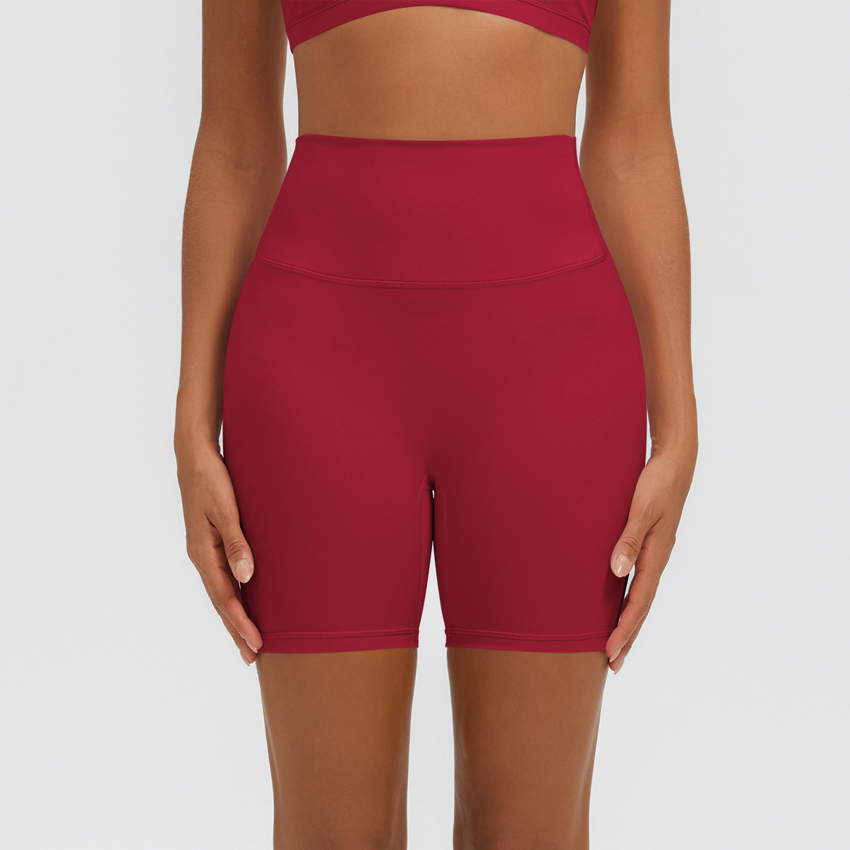 Nuevo tipo delgado de hielo, piel transpirable, ajustado, color sólido, ropa de yoga, pantalones cortos de tres puntos.