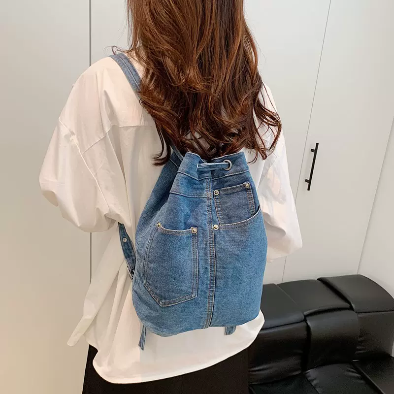 跨境新款韩系小众牛仔布小背包女潮束口抽绳水桶包时尚休闲双肩包