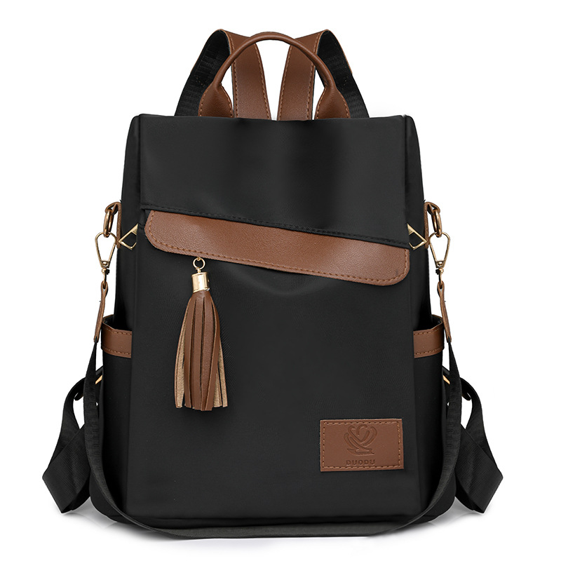 2024 otoño, nueva mochila antirrobo para mujer, borla de moda, color de contraste, nailon, mochila de viaje, mochila escolar, marea