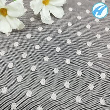 涤纶提花圆点网布镂空童裙经编布装饰服装网厂家